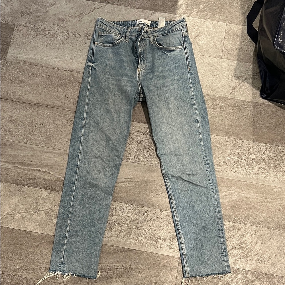 High waisted straight leg medium blue denim jeans